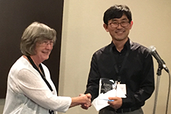 Hyungil Kim receiving the award Hyungil Kim receiving award